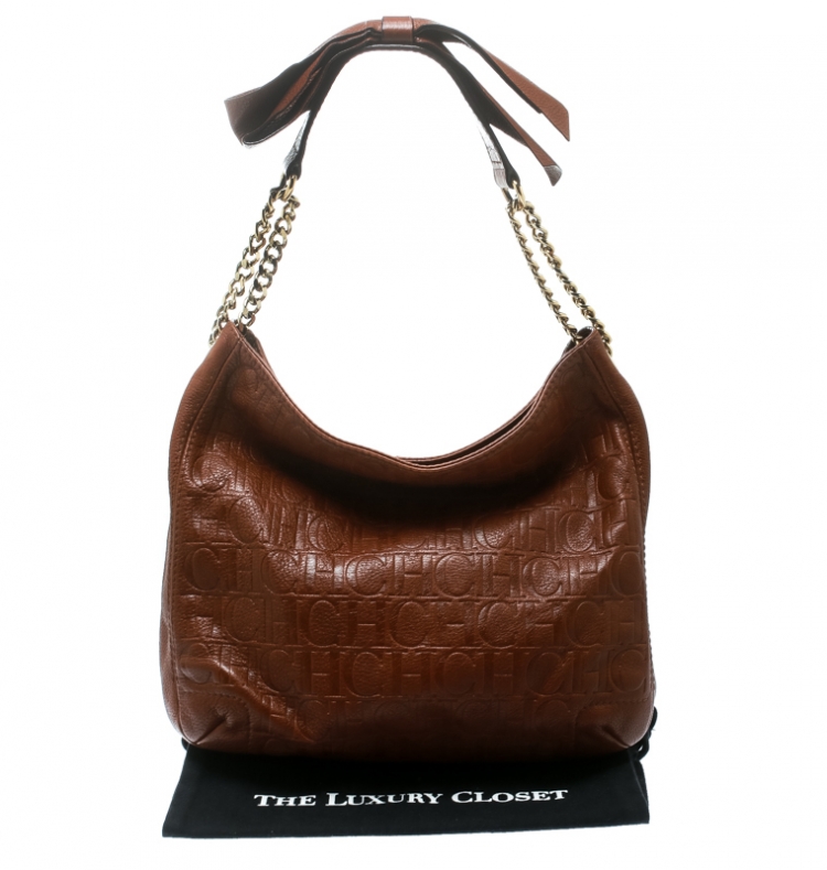 Pre Owned Carolina Herrera Brown Monogram Leather Bow Hobo