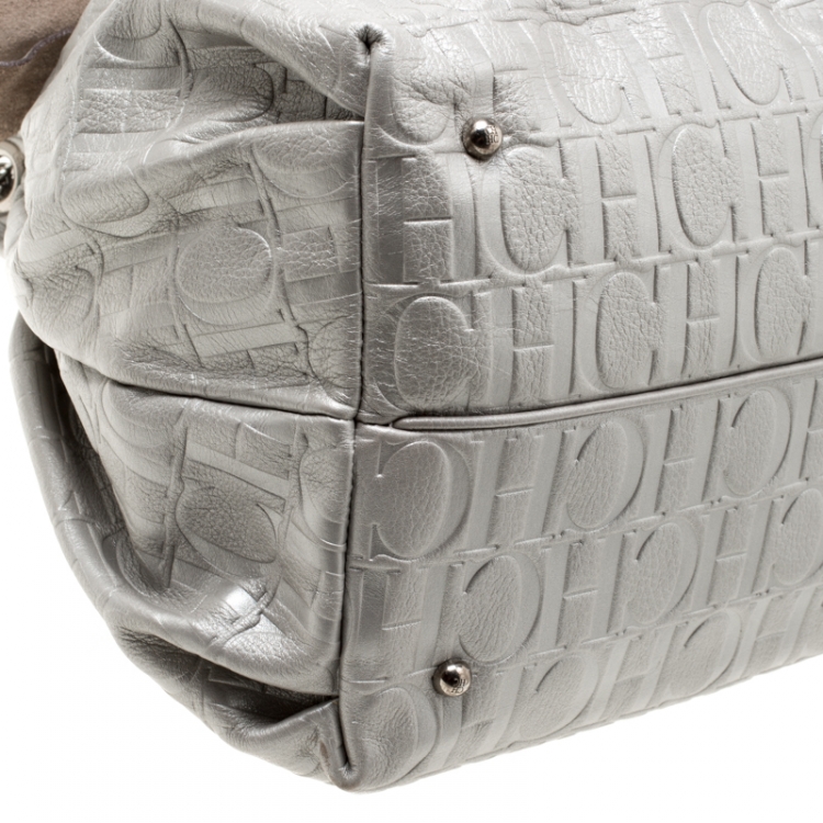 Pre Owned Carolina Herrera Silver Monogram Leather Bow Bucket Hobo