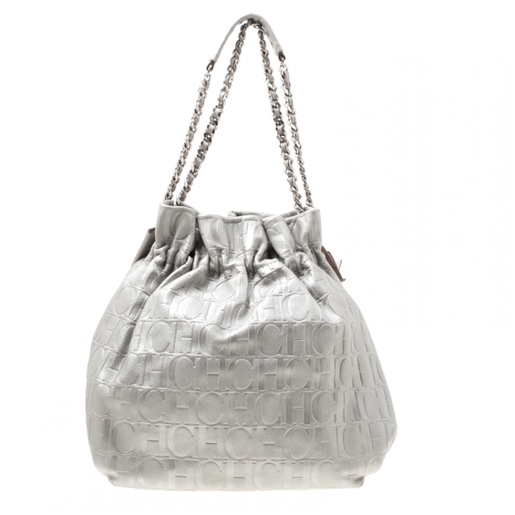 Pre Owned Carolina Herrera Silver Monogram Leather Bow Bucket Hobo