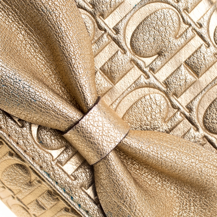 مملوكة مسبقًا Carolina Herrera Gold Monogram Leather Bow Bag