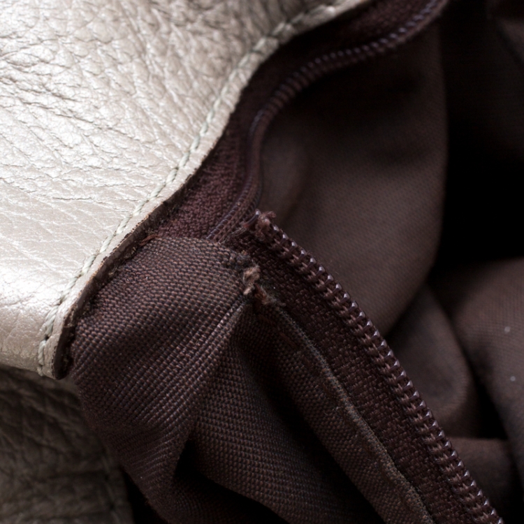 Pre Owned Carolina Herrera Silver Monogram Embossed Leather Bow Bucket Shoulder Bag