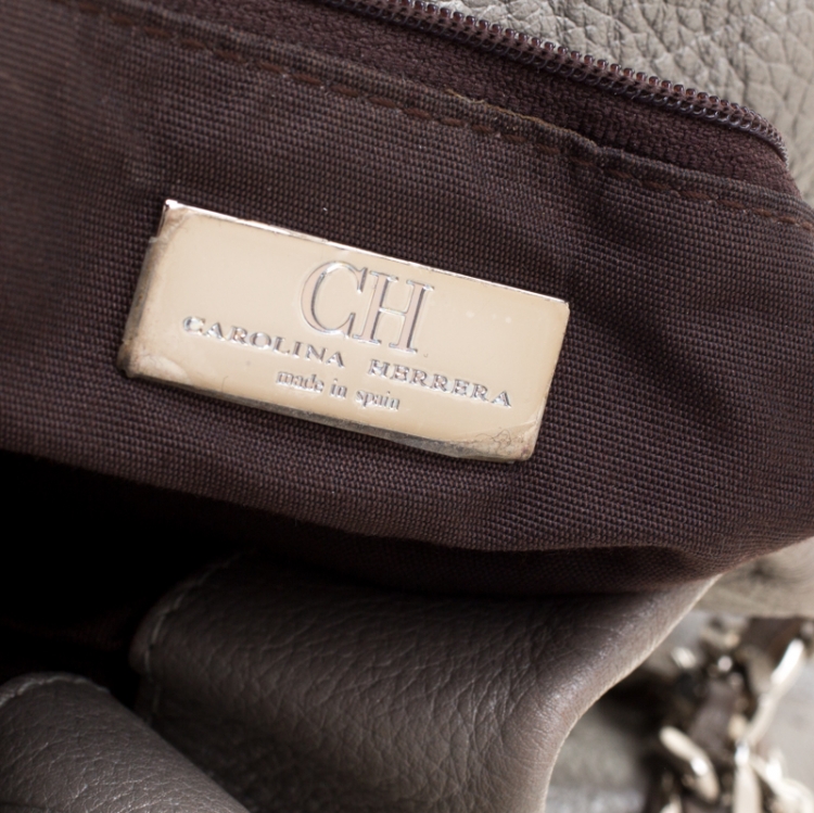 Pre Owned Carolina Herrera Silver Monogram Embossed Leather Bow Bucket Shoulder Bag