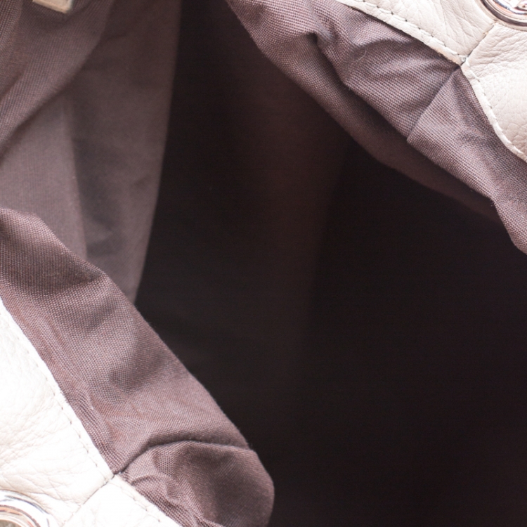 Pre Owned Carolina Herrera Silver Monogram Embossed Leather Bow Bucket Shoulder Bag