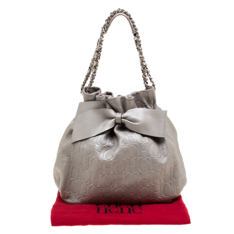 Pre Owned Carolina Herrera Silver Monogram Embossed Leather Bow Bucket Shoulder Bag