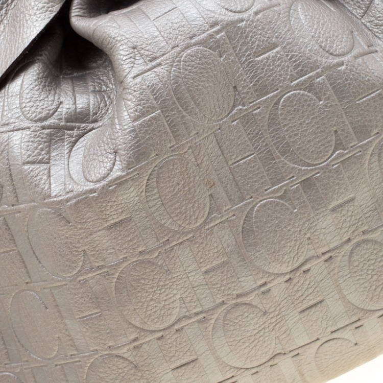 Pre Owned Carolina Herrera Silver Monogram Embossed Leather Bow Bucket Shoulder Bag