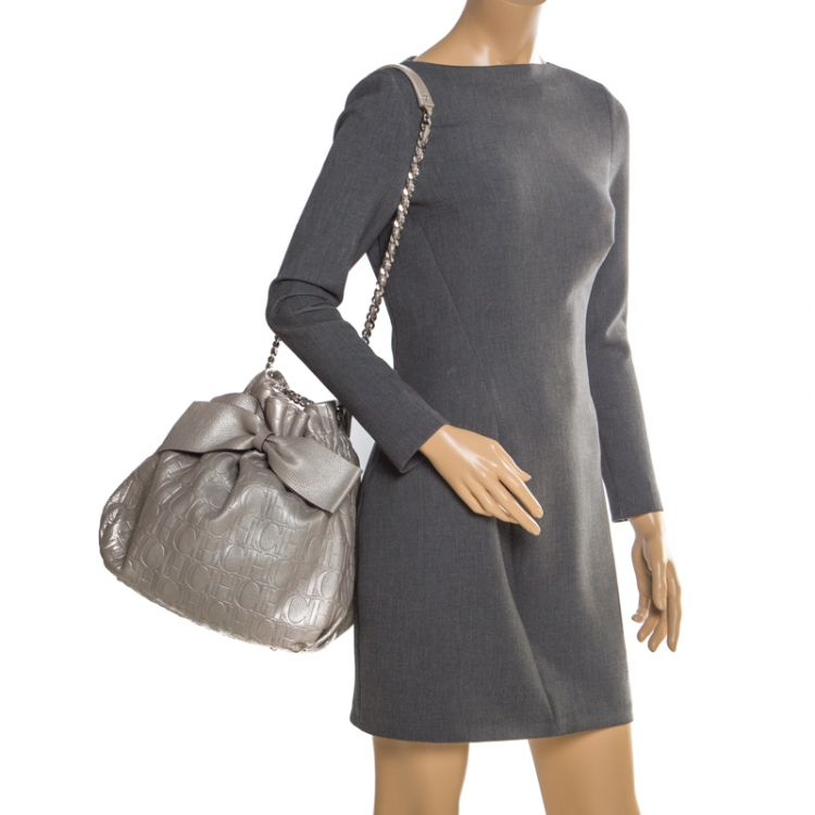 Pre Owned Carolina Herrera Silver Monogram Embossed Leather Bow Bucket Shoulder Bag