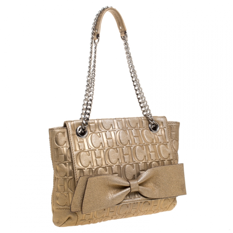 Pre Owned Carolina Herrera Gold Monogram Embossed Leather Bow Flap Shoulder Bag