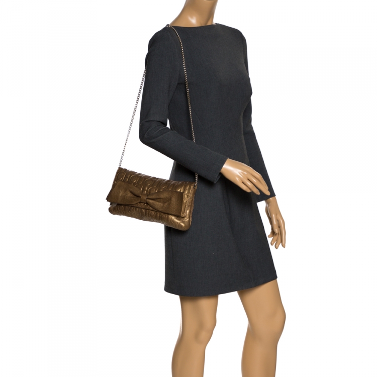 Pre Owned Carolina Herrera Gold Monogram Embossed Leather Bow Shoulder Bag