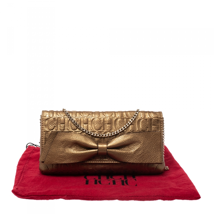Pre Owned Carolina Herrera Gold Monogram Embossed Leather Bow Shoulder Bag