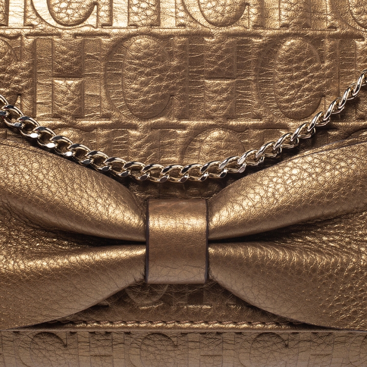 Pre Owned Carolina Herrera Gold Monogram Embossed Leather Bow Shoulder Bag