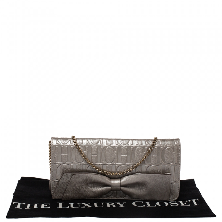 Pre Owned Carolina Herrera Silver Monogram Leather Bow Chain Clutch
