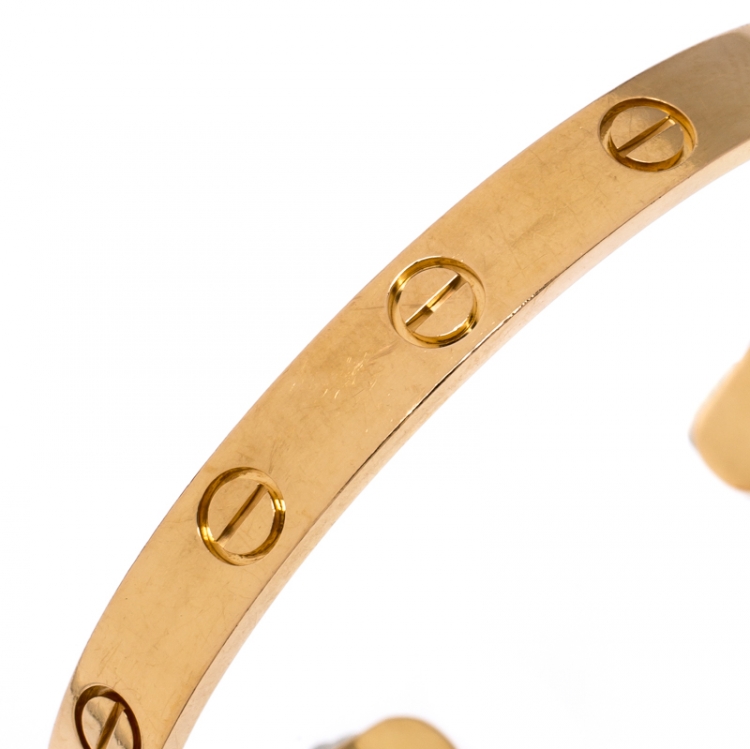 Pre Owned Cartier Love 18K Yellow Gold Open Cuff Bracelet Size 16