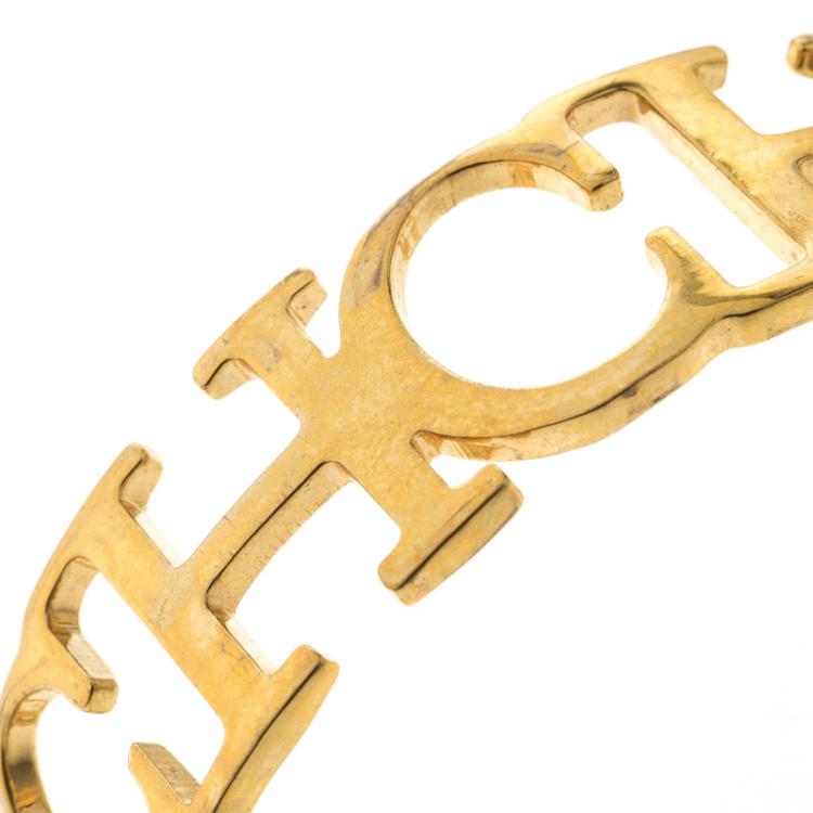 Pre Owned Carolina Herrera CH Gold Tone Wide Open Cuff Bracelet 18cm
