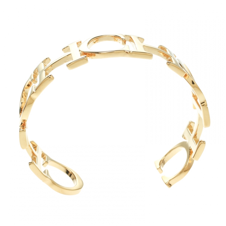 Pre Owned CH Carolina Herrera Logo Gold Tone Open Cuff Bracelet