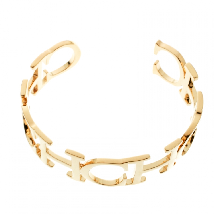 Pre Owned CH Carolina Herrera Logo Gold Tone Open Cuff Bracelet