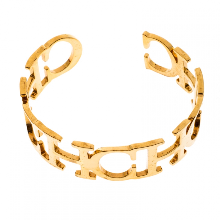 Pre Owned CH Carolina Herrera Logo Gold Tone Open Cuff Bracelet