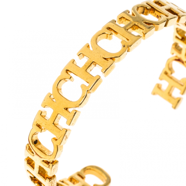 Pre Owned CH Carolina Herrera Logo Gold Tone Open Cuff Bracelet