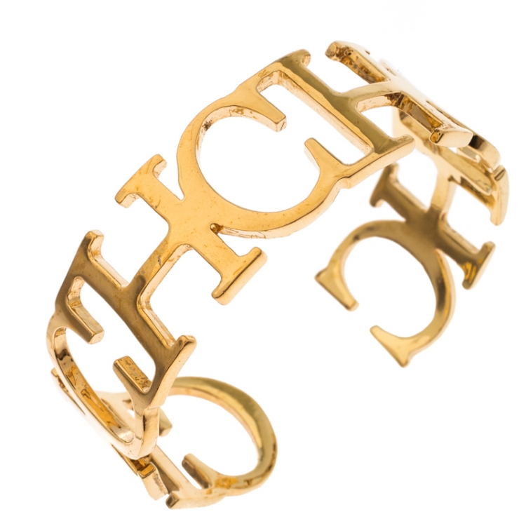 Pre Owned CH Carolina Herrera Logo Gold Tone Open Cuff Bracelet