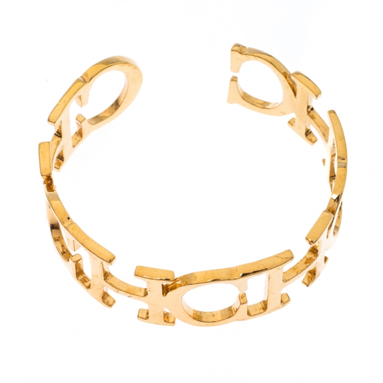 Pre Owned CH Carolina Herrera Logo Gold Tone Open Cuff Bracelet