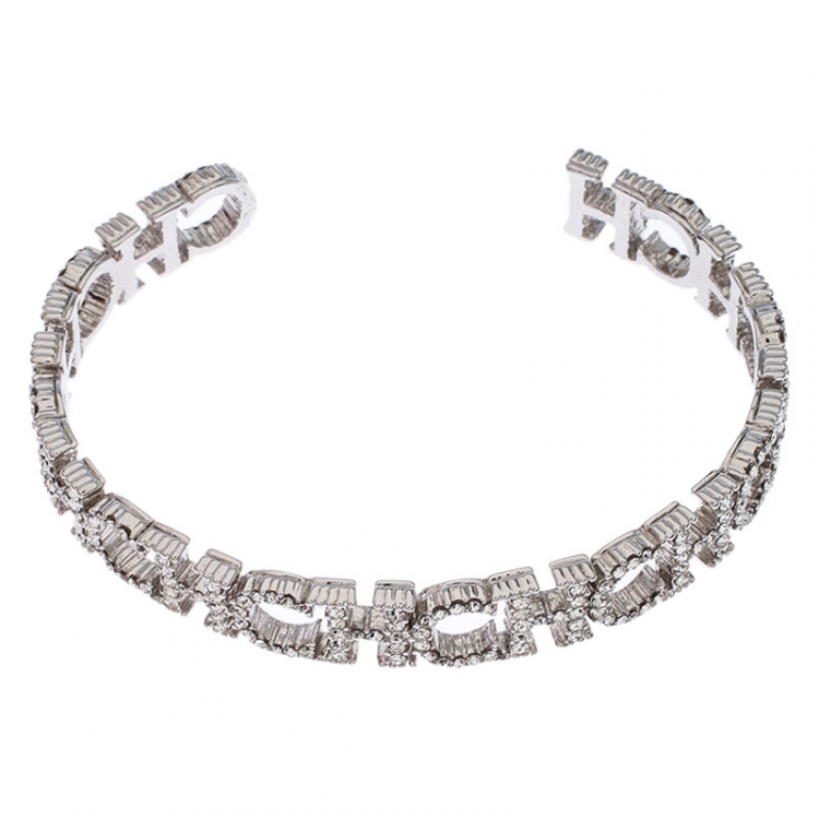 Pre Owned CH Carolina Herrera Crystal Logo Silver Tone Open Cuff Bracelet