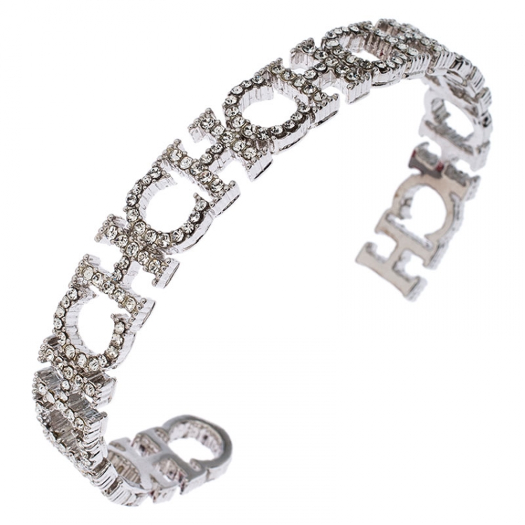 Pre Owned CH Carolina Herrera Crystal Logo Silver Tone Open Cuff Bracelet