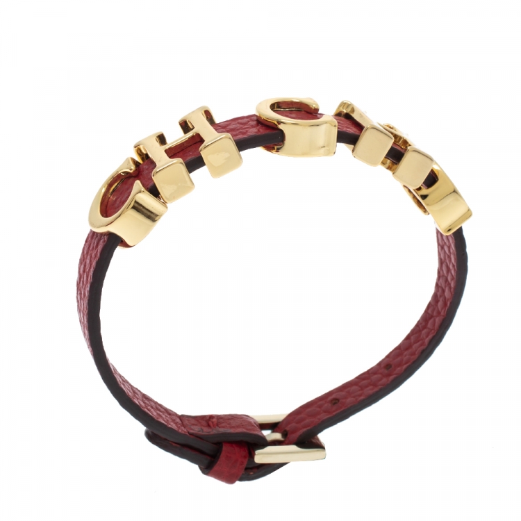 Pre Owned CH Carolina Herrera Red Leather Gold Tone Logo Charm Bracelet