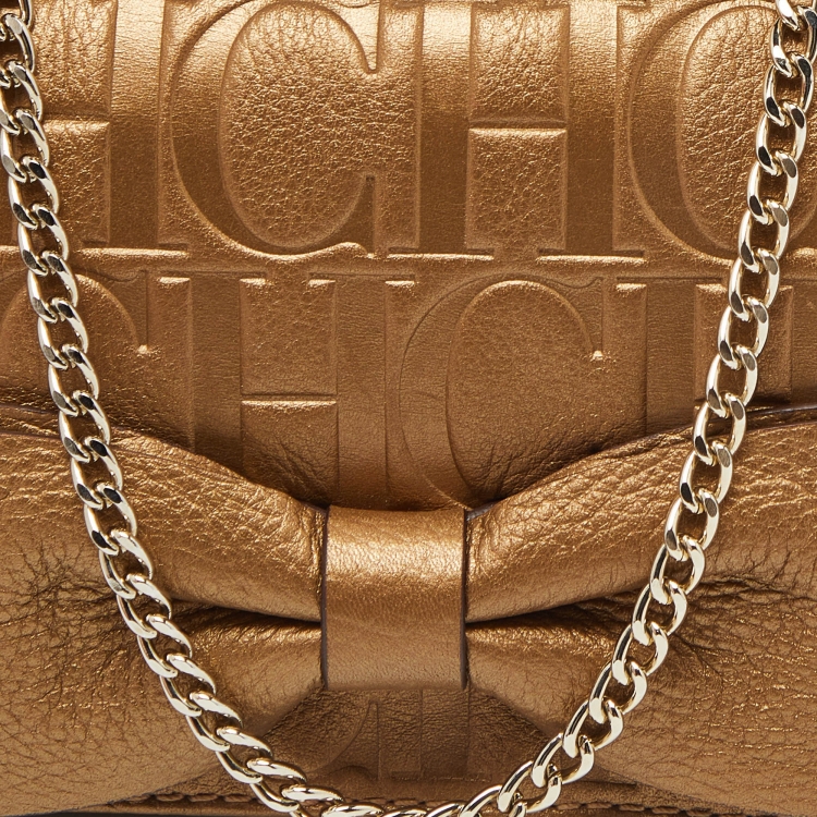 Pre Owned CH Carolina Herrera Gold Monogram Embossed Leather Bow Chain Clutch