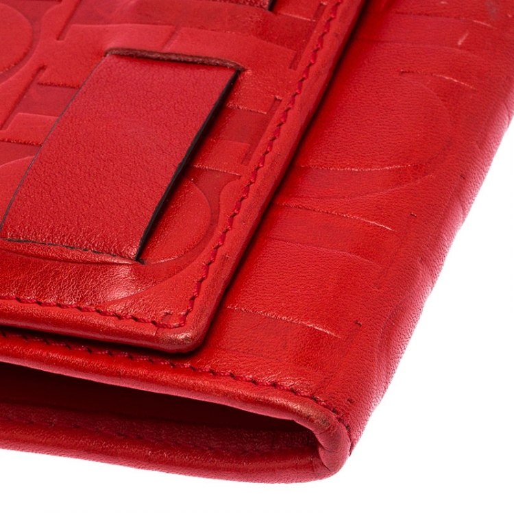 Pre Owned Carolina Herrera Red Monogram Embossed Leather Flap Continental Wallet