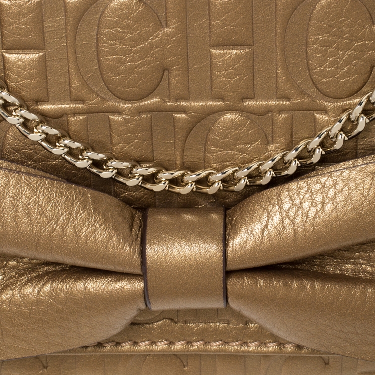 Pre Owned Carolina Herrera Gold Monogram Leather Bow Chain Clutch