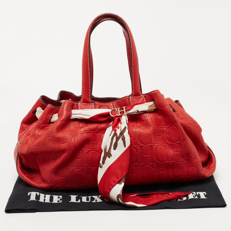 Pre Owned CH Carolina Herrera Red Monogram Embossed Leather Scarf Hobo
