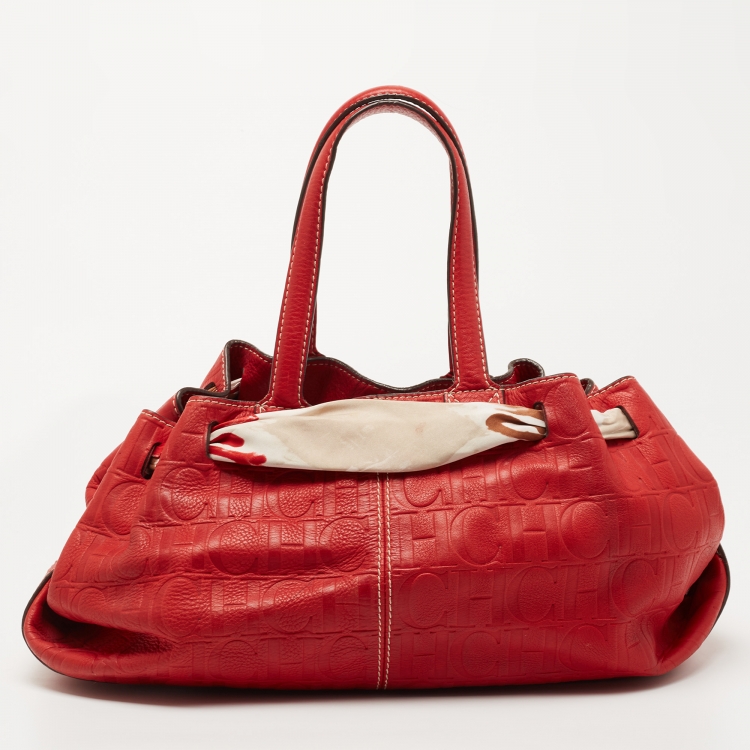 Pre Owned CH Carolina Herrera Red Monogram Embossed Leather Scarf Hobo