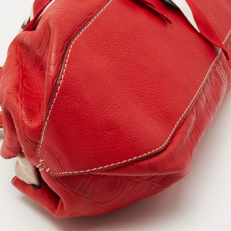 Pre Owned CH Carolina Herrera Red Monogram Embossed Leather Scarf Hobo