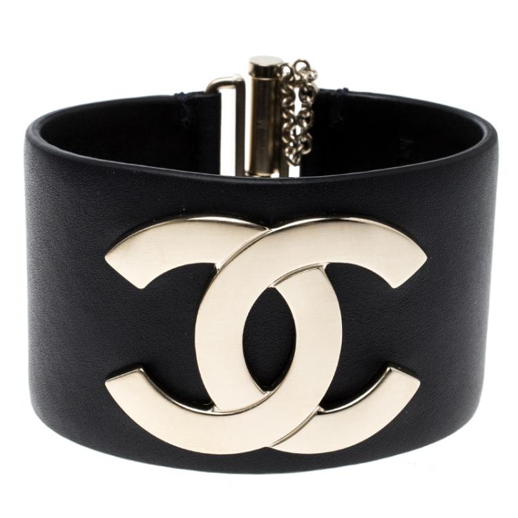 CHANEL Resin CC Paris Button Cuff Bracelet Black Gold 1353050 | FASHIONPHILE