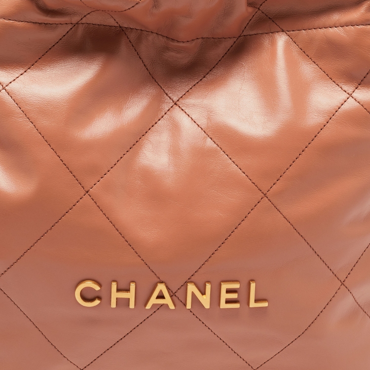 Pre Owned Chanel Brown Quilted Glossy Leather Drawstring 22 Hobo