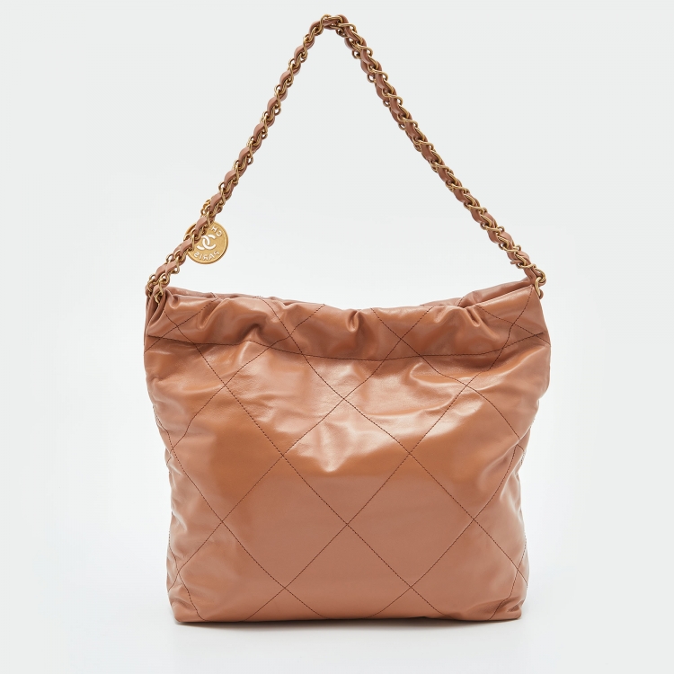 Pre Owned Chanel Tan Quilted Glossy Leather Drawstring 22 Bag