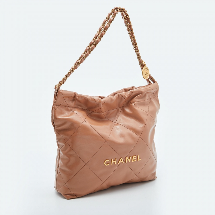 Pre Owned Chanel Tan Quilted Glossy Leather Drawstring 22 Bag
