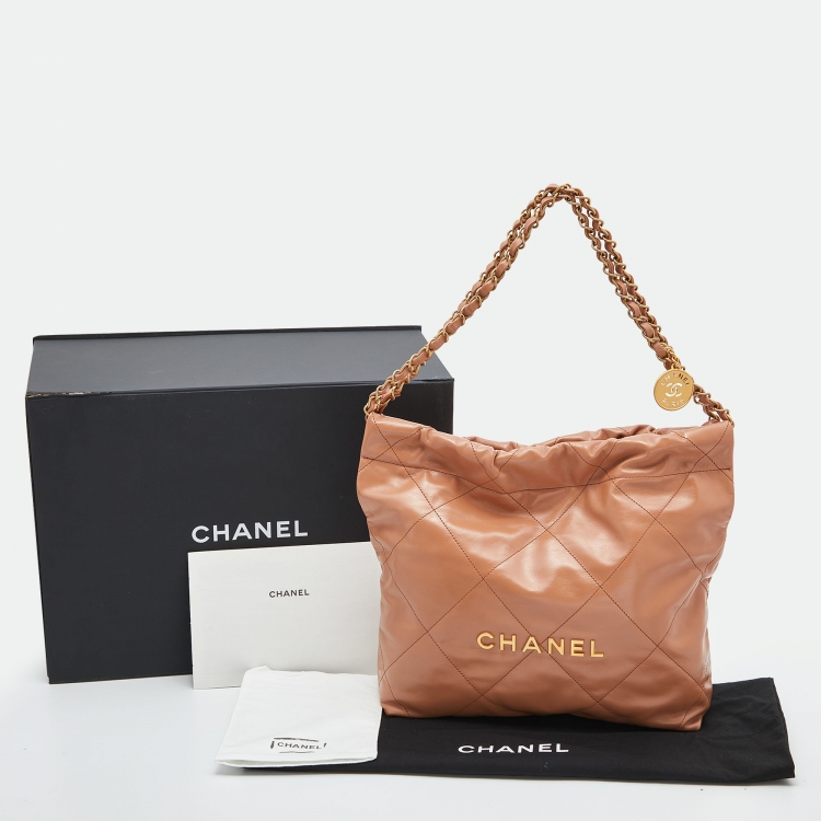 Pre Owned Chanel Tan Quilted Glossy Leather Drawstring 22 Bag