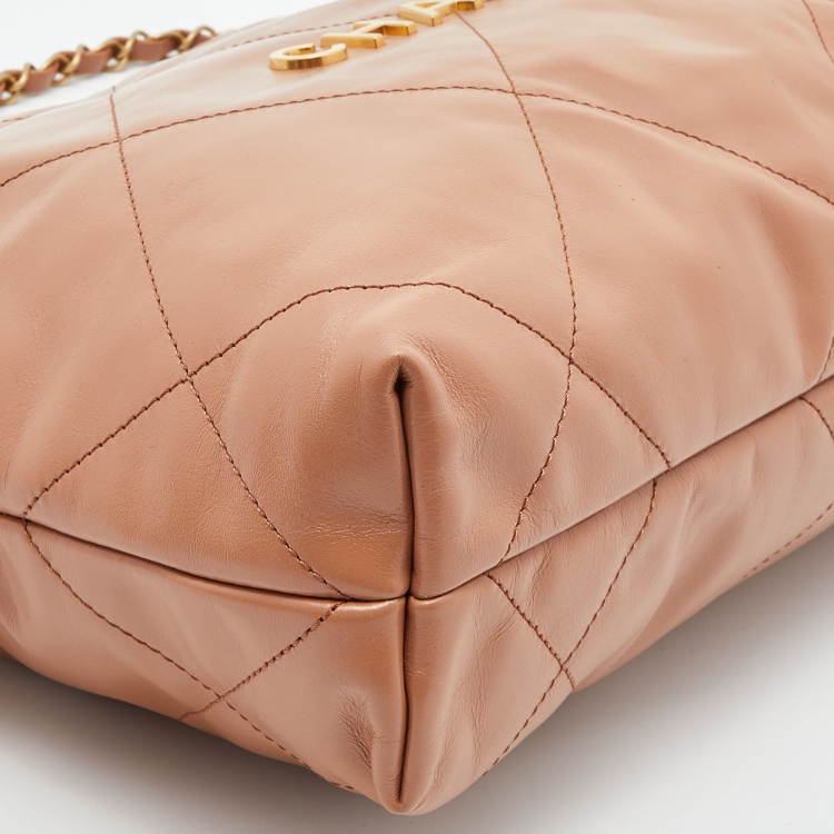 Pre Owned Chanel Tan Quilted Glossy Leather Drawstring 22 Bag