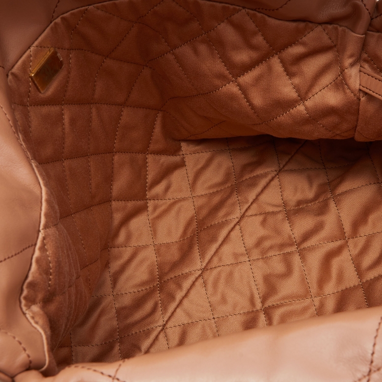 Pre Owned Chanel Tan Quilted Glossy Leather Drawstring 22 Bag