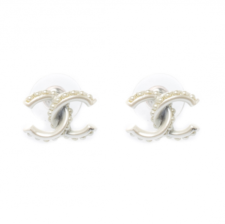 cc stud white earrings