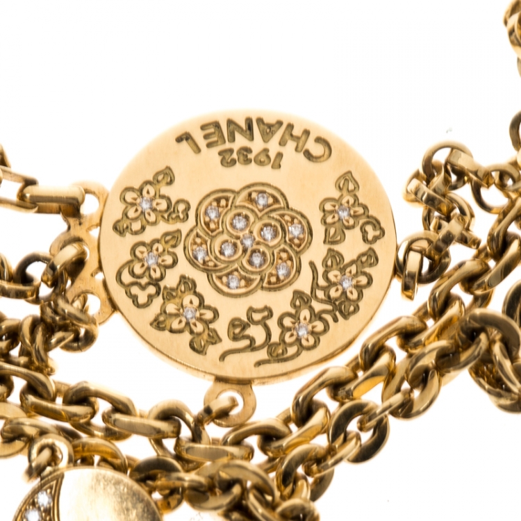 Pre Owned Chanel Camelia No 5 Yellow Gold And Diamond Charm Bracelet