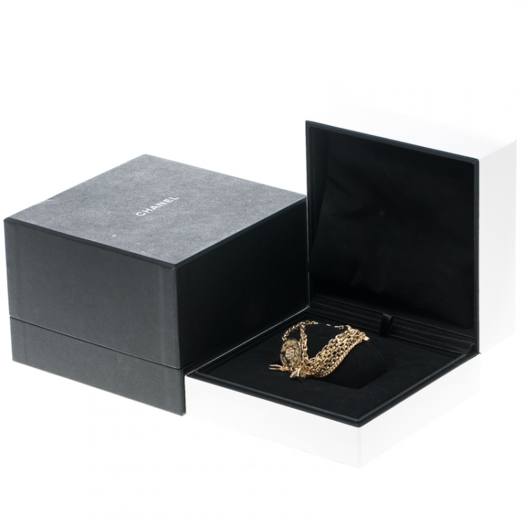 Pre Owned Chanel Camelia No 5 Yellow Gold And Diamond Charm Bracelet