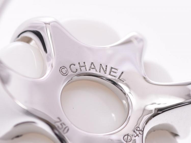 Pre Owned Chanel White Ceramic Camellia Ring Size 48