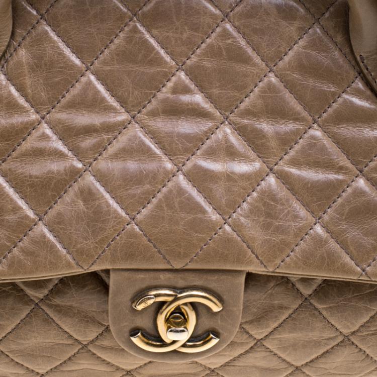 Pre Owned Chanel Beige Quilted Glazed Leather Medium Castle Rock Top Handle Bag