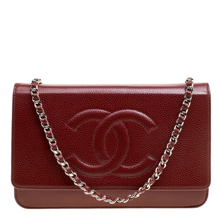 dark red clutch bag