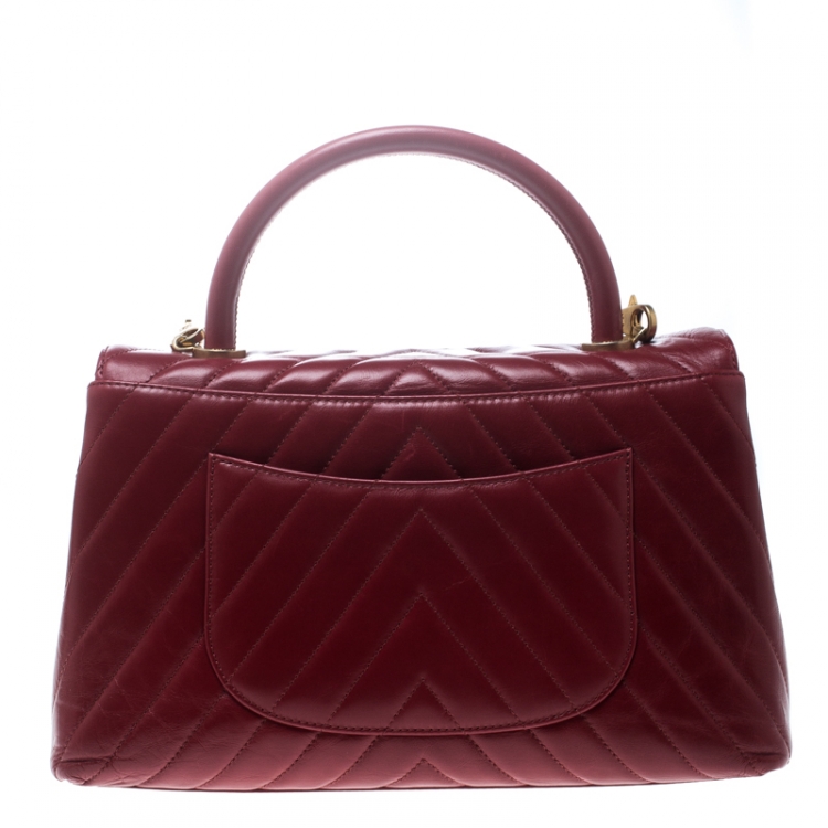 Pre Owned Chanel Red Chevron Quilted Leather Small Coco Top Handle Bag