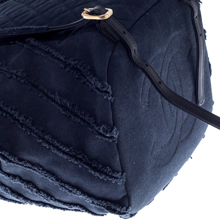 Pre Owned Chanel Navy Blue  Chevron Denim Medium Drawstring Patchwork Backpack                        