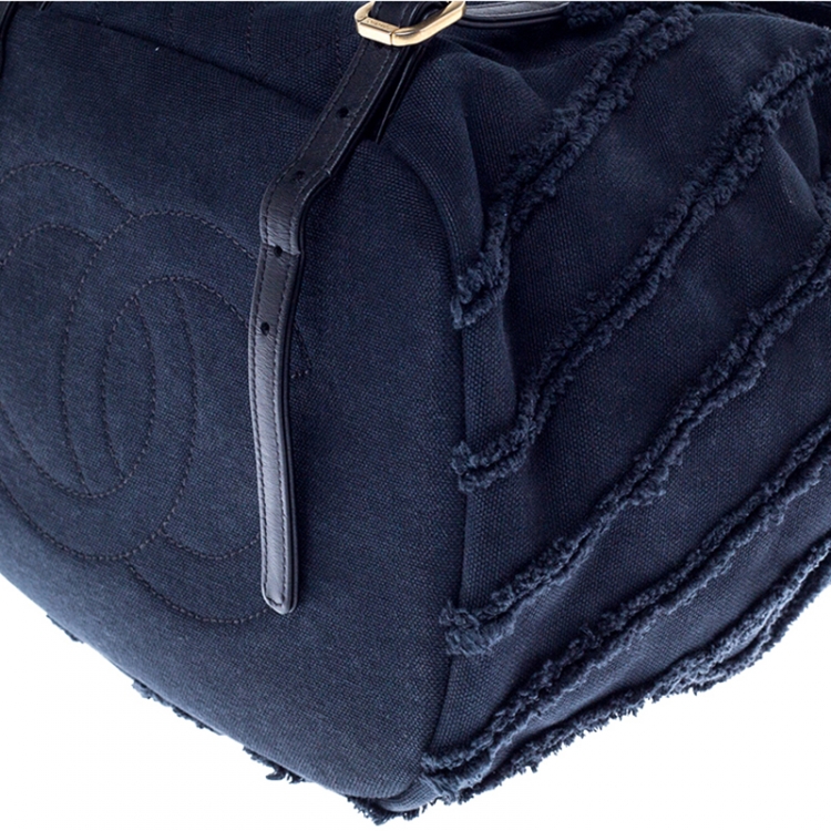 Pre Owned Chanel Navy Blue  Chevron Denim Medium Drawstring Patchwork Backpack                        
