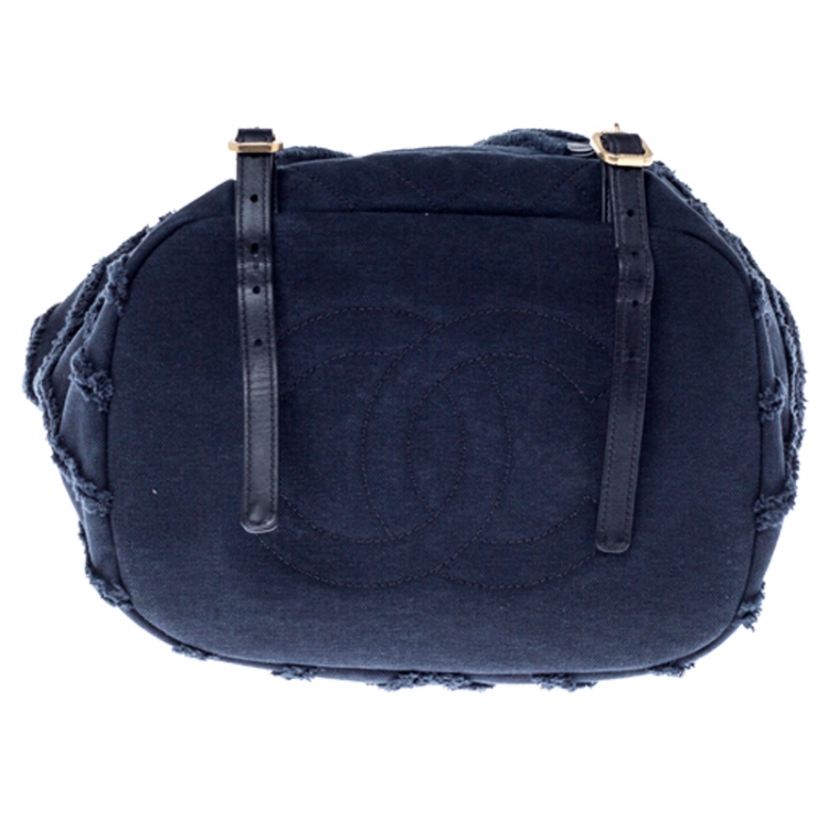 Pre Owned Chanel Navy Blue  Chevron Denim Medium Drawstring Patchwork Backpack                        