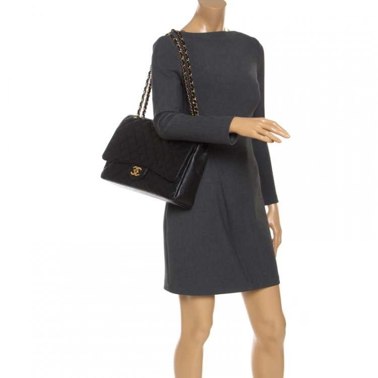 Pre Owned Chanel Black Quilted Caviar Leather Maxi Classic Single Flap Bag